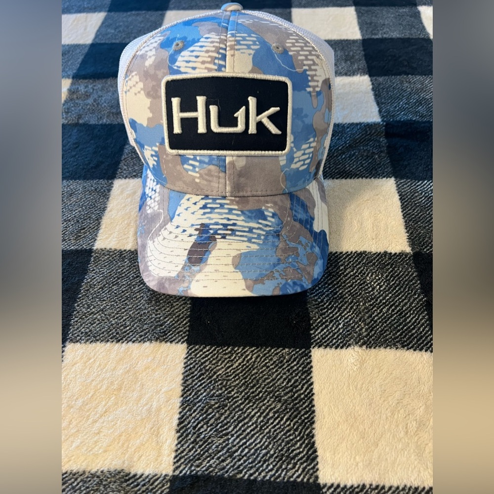 HUK fishing ball cap.
